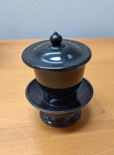 Water cup, black, plastic - SGI Finland Shop